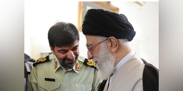 Iranian Supreme Leader Ayatollah Ali Khamenei, right, speaks with Gen. Ahmad-Reza Radan on Jan. 7, 2023.