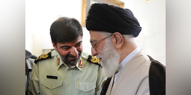 Iranian Supreme Leader Ayatollah Ali Khamenei, right, speaks with Gen. Ahmad-Reza Radan on Jan. 7, 2023.