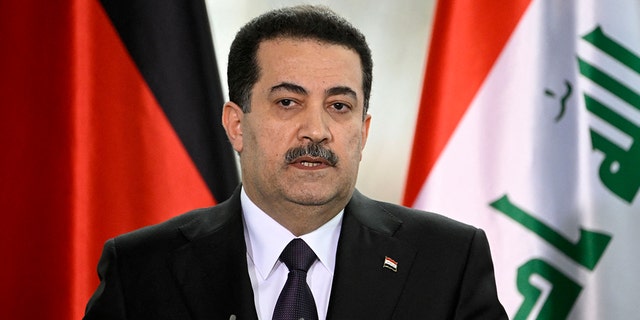 De Iraakse premier Mohammed Shia al-Sudani en de Duitse bondskanselier (niet op de foto) geven op 13 januari 2023 een gezamenlijke persconferentie in de kanselarij in Berlijn. 