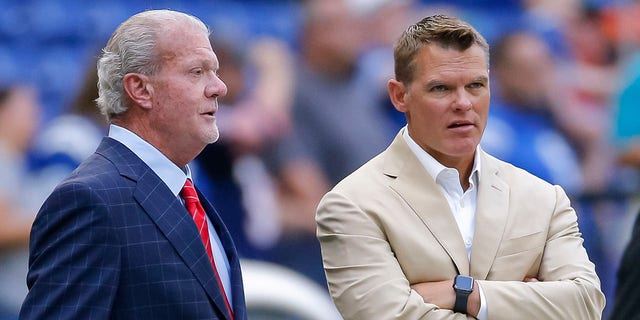 INDIANAPOLIS, IN - AUGUST 24: Indianapolis Colts owner Jim Irsay and general manager Chris Ballard watch pregame warmups before a preseason game against the Chicago Bears at Lucas Oil Stadium on August 24. August 2019 in Indianapolis, Indiana.