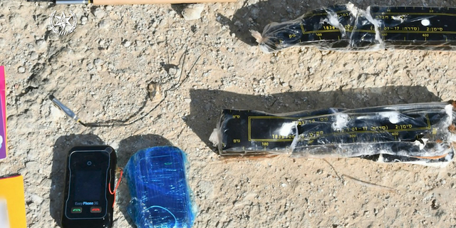 Cellphones and explosives recovered by Tel Aviv police as part of their covert operation.