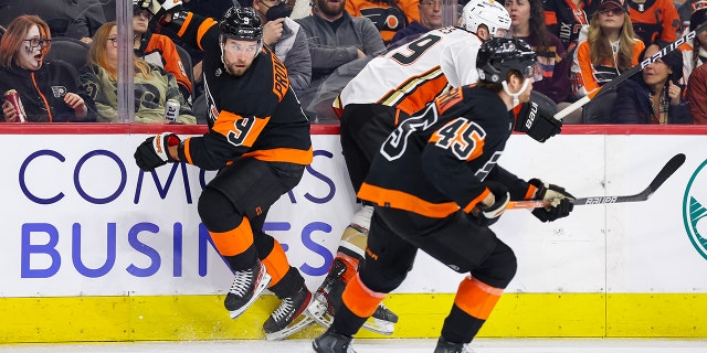 Ivan Provorov, left, of the Flyers during the Anaheim Ducks game at Wells Fargo Center on Jan. 17, 2023, in Philadelphia.