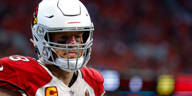 JJ Watt of the Arizona Cardinals stands on the sideline during the second half against the Atlanta Falcons at Mercedes-Benz Stadium on January 1, 2023 in Atlanta. 