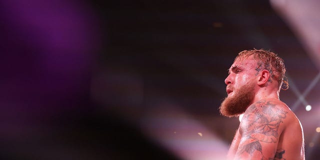 Jake Paul stands in the corner during his cruiserweight fight against Anderson Silva at Desert Diamond Arena on October 29, 2022 in Glendale, Arizona.