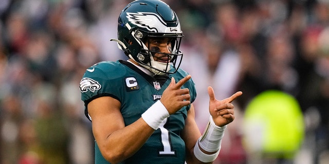 Philadelphia Eagles quarterback Jalen Hurts gestures during the first half of the NFL Championship NFL football game between the Philadelphia Eagles and the San Francisco 49ers on Sunday, January 29, 2023, in Philly. 