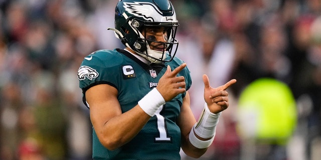 Philadelphia Eagles quarterback Jalen Hurts gestures during the first half of the NFC Championship NFL football game between the Philadelphia Eagles and the San Francisco 49ers on Sunday, Jan. 29, 2023, in Philadelphia.