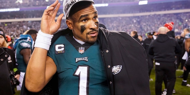 Philadelphia Eagles quarterback Jalen Hurts walks down the field after the NFL Championship NFL football game between the Philadelphia Eagles and the San Francisco 49ers on Sunday, Jan. 29, 2023, in Philadelphia.