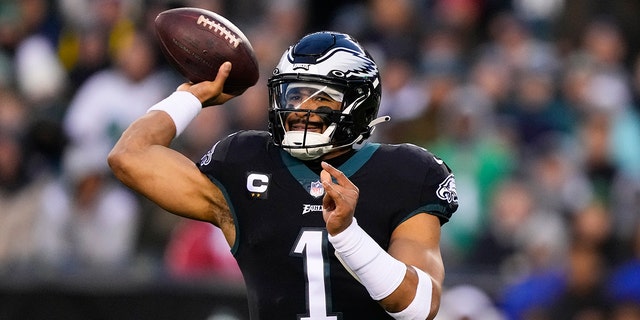 Philadelphia Eagles quarterback Jalen Hurts throws a pass against the New York Giants during the first half of an NFL football game, Sunday, Jan. 8, 2023, in Philadelphia.