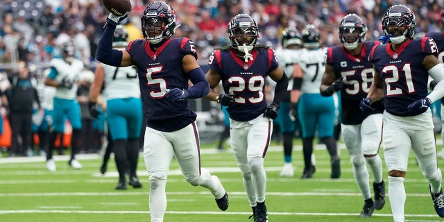 Texans safety Jalen Pitre celebrates his interception against the Jacksonville Jaguars in Houston, Sunday, Jan. 1, 2023.