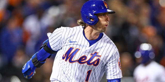 Jeff McNeil of the New York Mets hits a two-run double during the seventh inning of Game Two of the Wild Card Series against the San Diego Padres at Citi Field on October 8, 2022 in New York City.