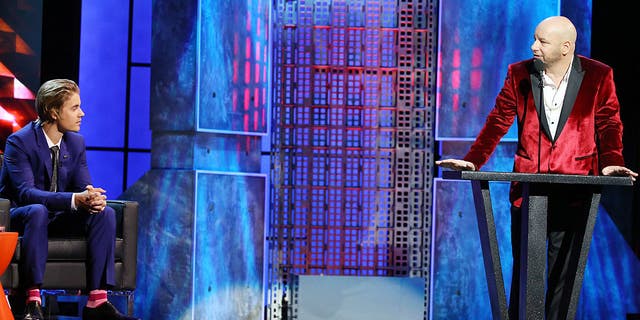 Jeff Ross and Justin Bieber on stage during the Comedy Central roast of Justin Bieber in 2015.
