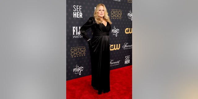 Jennifer Coolidge sports a black velour dress at Critics Choice Awards in LA. 