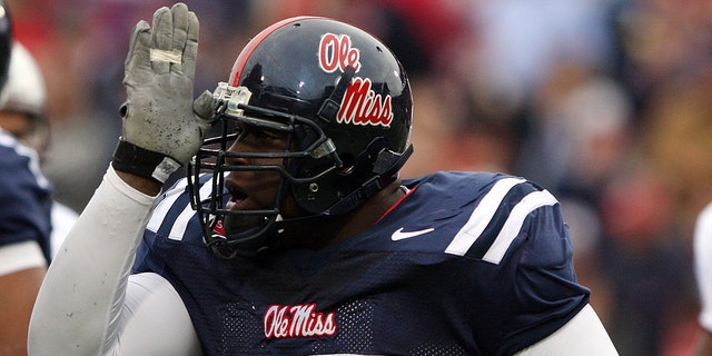 Jerrell Powe #57 of the Ole Miss Rebels celebrates a sack against the Mississippi State Bulldogs during the game at Vaught-Hemingway Stadium on November 28, 2008 in Oxford, Mississippi. 