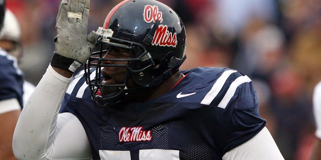 Jerrell Powe #57 of the Ole Miss Rebels celebrates a sack against the Mississippi State Bulldogs during the game at Vaught-Hemingway Stadium on November 28, 2008 in Oxford, Mississippi.