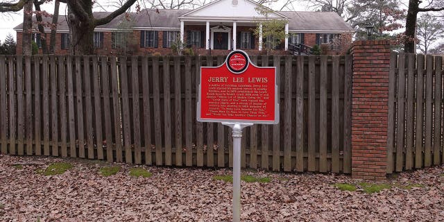 Signs around the Lewis ranch give a little history into Jerry Lee's life.