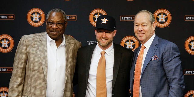 Astros manager Dusty Baker, left, general manager James Click and owner Jim Crane during a press conference at Minute Maid Park on Feb. 4, 2020, in Houston.