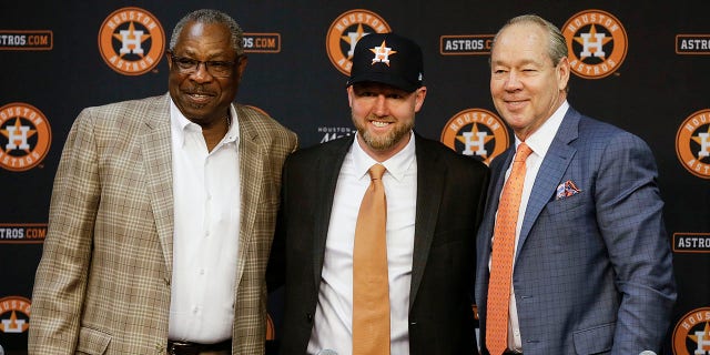 Astros manager Dusty Baker, left, general manager James Click and owner Jim Crane during a press conference at Minute Maid Park on Feb. 4, 2020, in Houston.