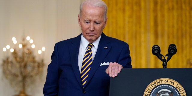 President Biden listens to a question during a news conference in the East Room of the White House in Washington, Jan. 19, 2022. 