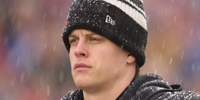 Joe Burrow of the Cincinnati Bengals looks on before kickoff against the Buffalo Bills at Highmark Stadium on January 22, 2023 in Orchard Park, New York.