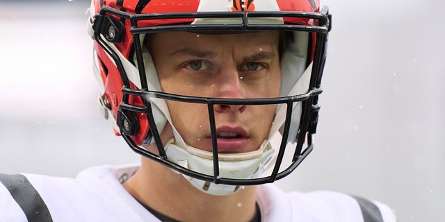 Joe Burrow of the Cincinnati Bengals warms up before kickoff against the Buffalo Bills at Highmark Stadium on January 22, 2023 in Orchard Park, New York.