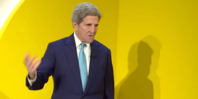 Special Presidential Envoy for Climate John Kerry addresses attendees of the World Economic Forum meeting on Tuesday.