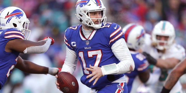 Buffalo Bills quarterback Josh Allen (17) plays in the second half of an NFL wildcard playoff football game against the Miami Dolphins on Sunday, January 15, 2023, in Orchard Park, NY