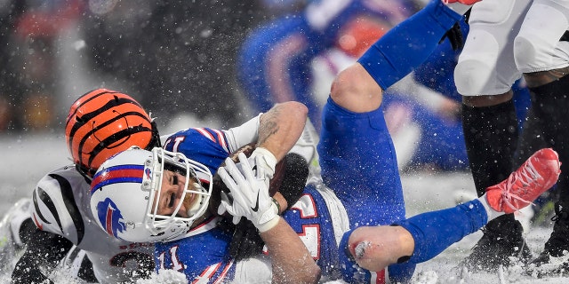 Buffalo Bills wide receiver Cole Beasley makes a catch against the Cincinnati Bengals during the third quarter of an NFL division round playoff game, Sunday, Jan. 22, 2023, in Orchard Park, New York.