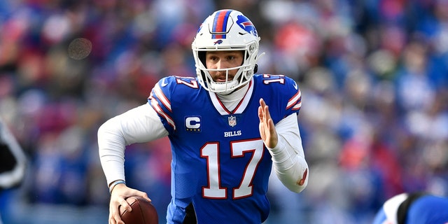 Buffalo Bills quarterback Josh Allen appears to pass against the Miami Dolphins, on January 15, 2023, in Orchard Park, New York.