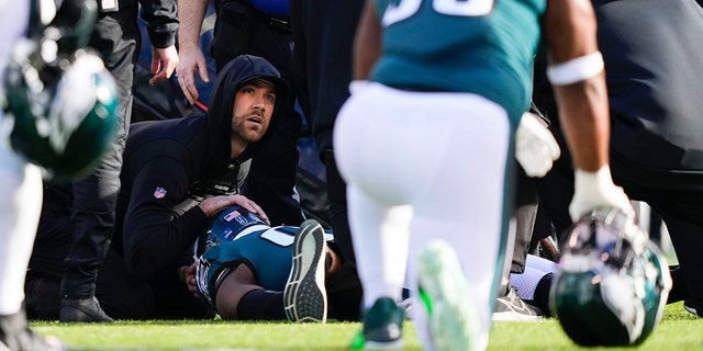 Eagles defensive end Josh Sweat is treated after injuring himself during a New Orleans Saints game in Philadelphia on Sunday, January 1, 2023.