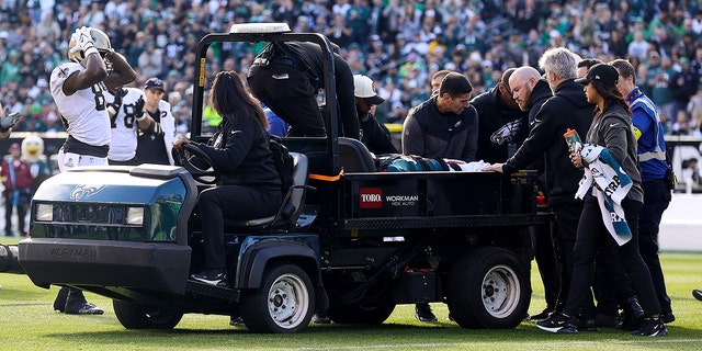 The Eagles' Josh Sweat is carried off the field following an injury at Lincoln Financial Field on January 1, 2023 in Philadelphia.