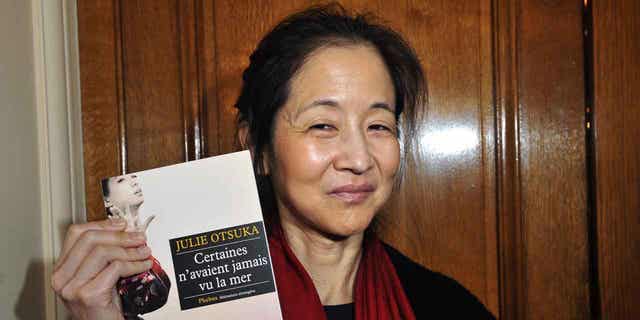 Japanese-born U.S. author Julie Otsuka, above, has been awarded the Andrew Carnegie Medal for Excellence in Fiction. Ed Yong won the same award for nonfiction. 