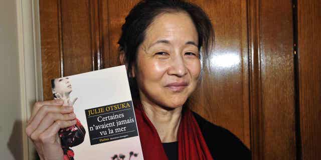 Japanese-born U.S. author Julie Otsuka, above, has been awarded the Andrew Carnegie Medal for Excellence in Fiction. Ed Yong won the same award for nonfiction.