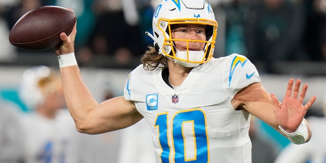 Justin Herbert takes clear stance on future of coaching staff, front office 1 Los Angeles Chargers quarterback Justin Herbert throws a pass against the Jacksonville Jaguars during the first half of a wild-card playoff game, Saturday, Jan. 14, 2023, in Jacksonville, Florida.
