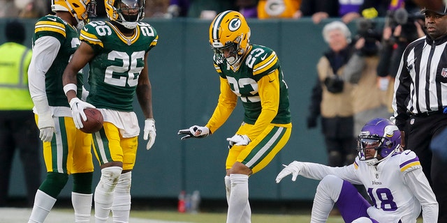 January 1, 2023;  Green Bay, Wisconsin, United States;  Green Bay Packers cornerback Jaire Alexander does the griddy after breaking up a pass intended for Minnesota Vikings wide receiver Justin Jefferson (18) at Lambeau Field.
