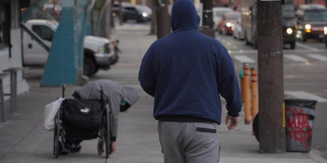 As Rodriguez approaches the man passed out from drugs, it's apparent that the addicts' wheelchair is facing downhill, pointed toward a street.