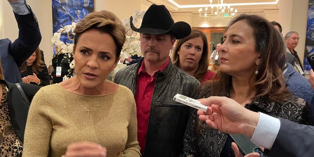 2022 GOP gubernatorial nominee Kari Lake of Arizona (left) joins RNC chair candidate Harmeet Dhillon in speaking to reporters, at the RNC winter meeting in Dana Point, California on Jan 25, 2023 