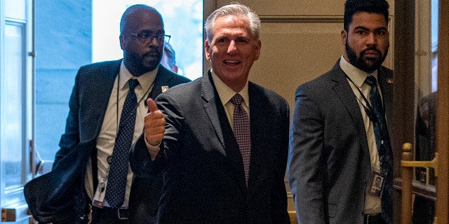 House Minority Leader Kevin McCarthy, R-Calif., center, arrives at the Capitol as the House met for a second day to elect a speaker and convene the 118th Congress on Capitol Hill in Washington, Wednesday, Jan. 4, 2023.