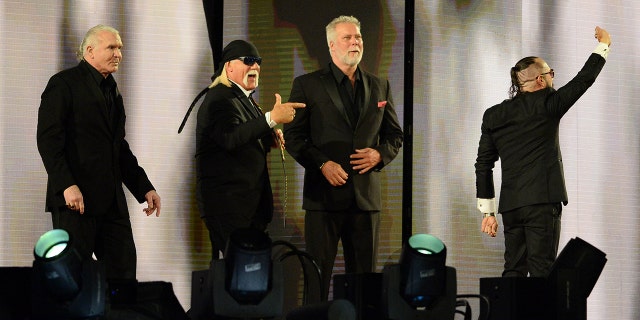 Apr 10, 2021; Tampa, Florida, USA; 2020 WWE Hall of Fame inductees Scott Hall and Hollywood Hulk Hogan and Kevin Nash and Sean Waltman aka NWO greet fans during WrestleMania 37 at Raymond James Stadium.