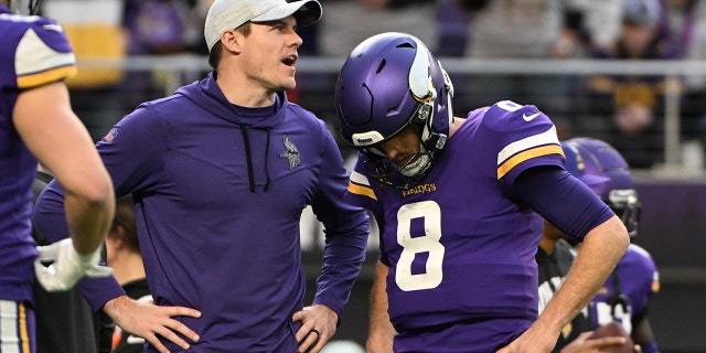 Kirk Cousins and head coach Kevin O'Connell of the Minnesota Vikings talk before the New York Giants game at U.S. Bank Stadium on Jan. 15, 2023 in Minneapolis.