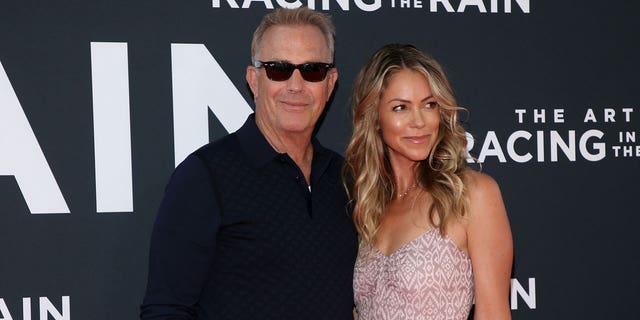 Kevin Costner and his wife Christine Baumgartner at the premiere of the film
