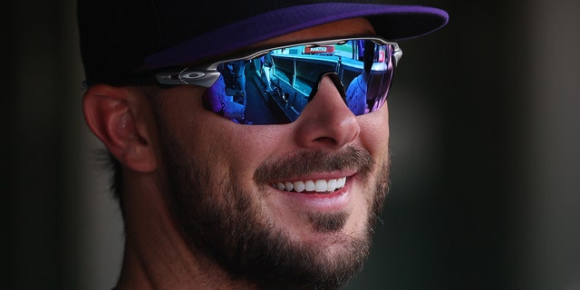 Kris Bryant of the Colorado Rockies watches from the sidelines against the Cubs at Wrigley Field on September 16, 2022 in Chicago.