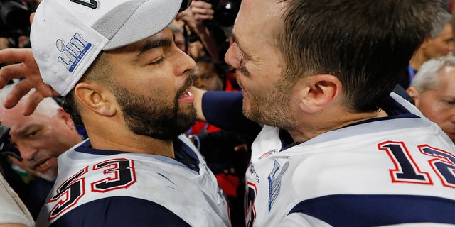 Tom Brady hugs Kyle Van Noy after the Patriots defeated the Los Angeles Rams 13-3 in Super Bowl LIII on February 3, 2019 in Atlanta.