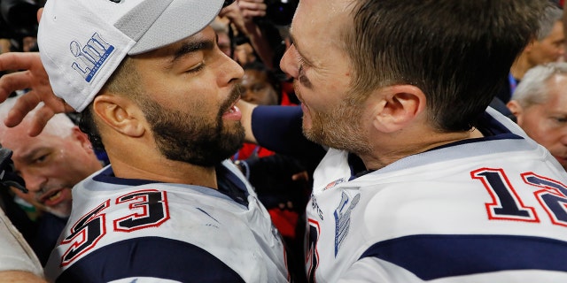 Tom Brady hugs Kyle Van Noy after the Patriots defeated the Los Angeles Rams 13-3 in Super Bowl LIII on February 3, 2019 in Atlanta.