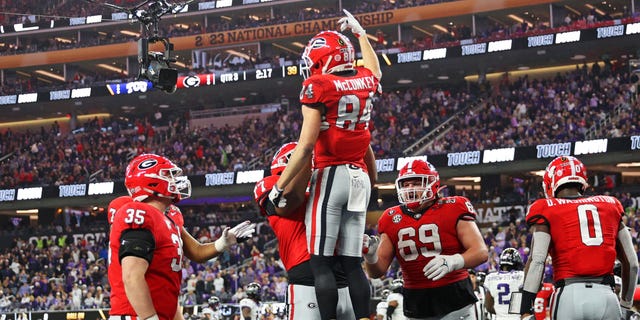Ladd McConkey #84 of the Georgia Bulldogs celebrates after scoring a touchdown during the third quarter against the TCU Horned Frogs in the College Football Playoff National Championship game at SoFi Stadium on January 09, 2023 in Inglewood, California.