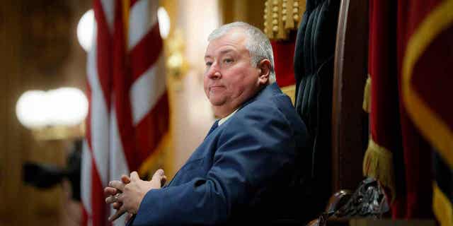 Former Ohio House Speaker Larry Householder sits at the head of a legislative session in Columbus, Ohio, on Oct. 30, 2019. The former Ohio House speaker goes on trial next week in a case arising from a $60 million federal bribery investigation that federal prosecutors label the largest corruption case in state history. 