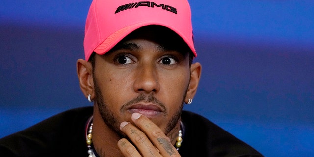 Lewis Hamilton of Great Britain and Mercedes react at a news conference during previews ahead of the Abu Dhabi F1 Grand Prix at Yas Marina Circuit in Abu Dhabi, United Arab Emirates on November 17, 2022. 