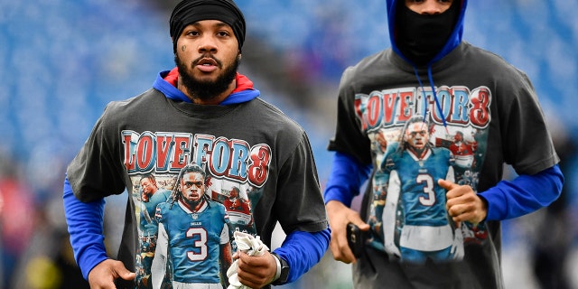 Buffalo Bills players wear the number 3 in support of safety Damar Hamlin during practice before an NFL football game against the New England Patriots, Sunday, Jan. 8, 2023, in Orchard Park, New York. 