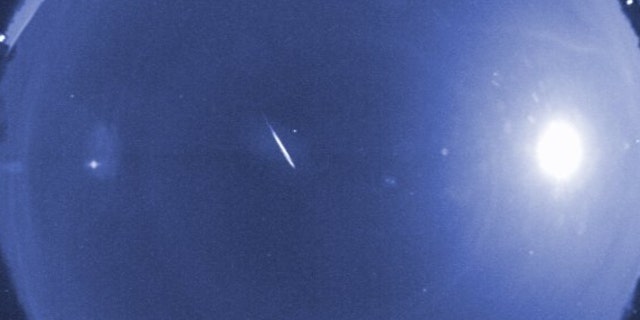 False-color image of a rare early Quadrantid, captured by a NASA meteor camera in 2010. 