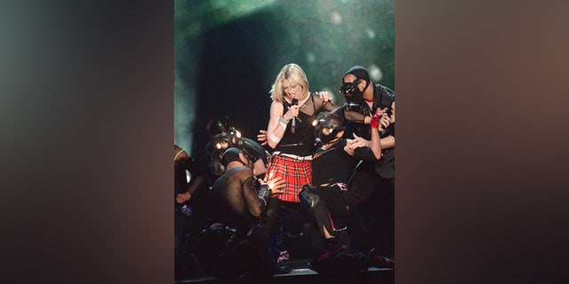 Pop star Madonna performs on stage during a concert on June 26, 2001, in Paris, France.