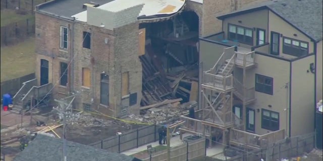A Chicago building collapse trapped a man, who was freed from debris by firefighters but remains in grave condition, Thursday, Jan. 12, 2023.